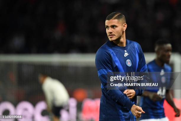 Paris Saint-Germain's Argentine forward Mauro Icardi looks on prior to the UEFA Champions league Group A football match between Paris Saint-Germain...