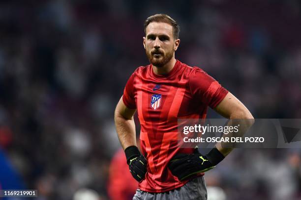 Atletico Madrid's Slovenian goalkeeper Jan Oblak looks on prior to the UEFA Champions League Group D football match between Atletico Madrid and...