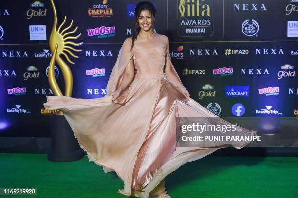 Bollywood actress Alia Bhatt poses at the 20th International Indian Film Academy Awards at NSCI Dome in Mumbai early on September 19, 2019.