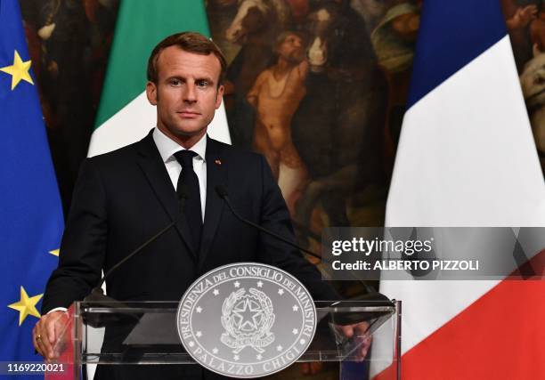 French President Emmanuel Macron looks on during a joint press conference following a meeting with Italy's Prime Minister on September 18, 2019 at...