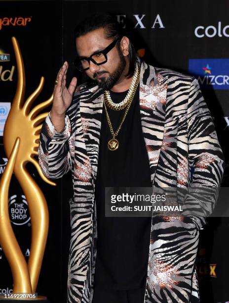 Bollywood signer Honey Singh arrives for the 20th International Indian Film Academy Awards at NSCI Dome in Mumbai on September 18, 2019.