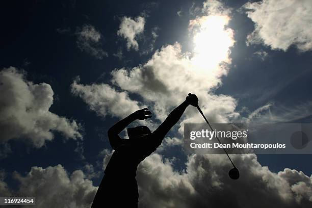 Jamie Elson of England hits practice balls on the driving range after his round on day three of the Saint Omer Open on June 18, 2011 in St. Omer,...