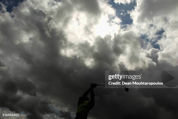 Jamie Elson of England hits practice balls on the driving range after his round on day three of the Saint Omer Open on June 18, 2011 in St. Omer,...