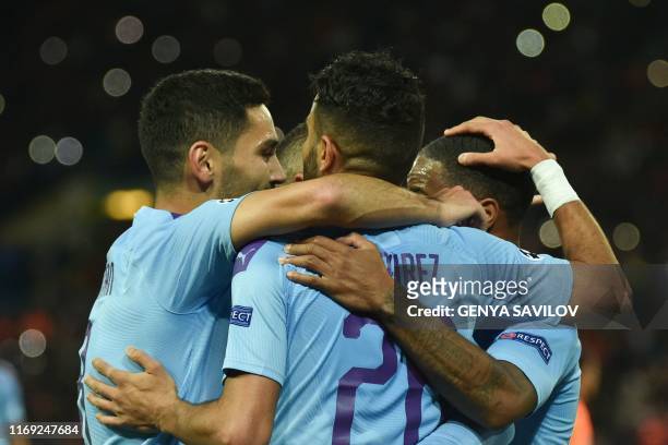 Manchester City's palyers celebrate a goal scored by Manchester City's German midfielder Ilkay Gundogan during the UEFA Champions League Group C...