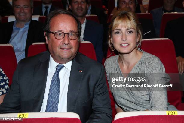 Former French President Francois Hollande and Julie Gayet attend the 12th Angouleme French-Speaking Film Festival : Day One - Opening Ceremony - on...