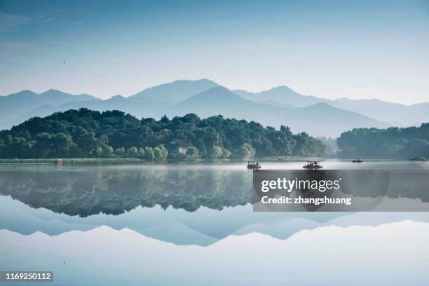 west lake ink landscape, hangzhou ,china - panoramic nature stock pictures, royalty-free photos & images