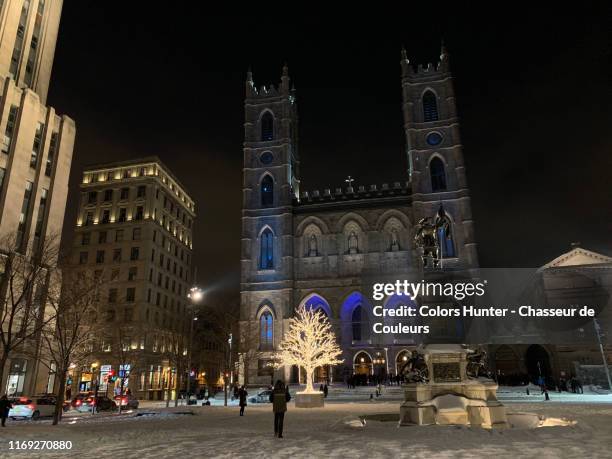 montreal place d'armes and cathedral at night in winter - old montreal stock pictures, royalty-free photos & images