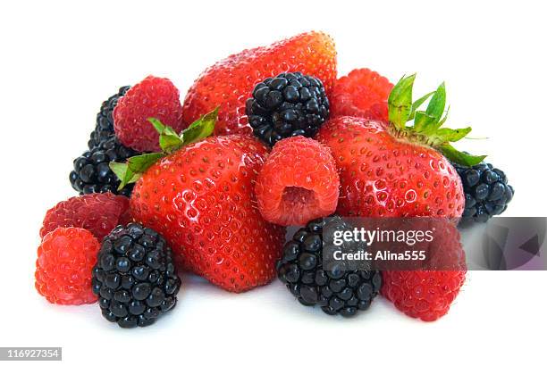 mixed berries - strawberries, blackberries and raspberries on white - blackberry stock pictures, royalty-free photos & images