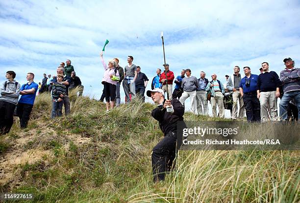 Michael Stewart of Scotland plays from the rough on the 11th during the Final of The Amateur Championship 2011 at Hillside Golf Club on June 18, 2011...