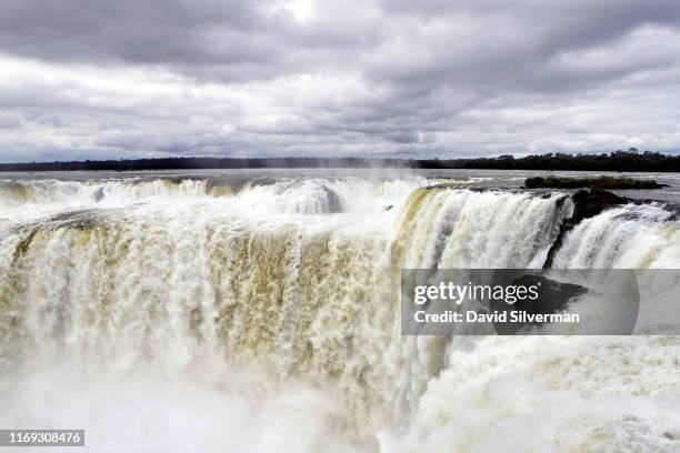 The Garganta del Diablo waterfall , the highest and one of the most popular and photographed of the 275 individual drops which make up the Iguazu...