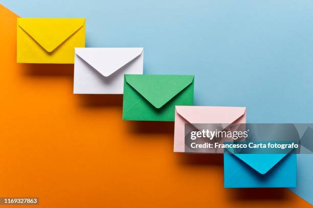 colored envelopes - message sent stock pictures, royalty-free photos & images