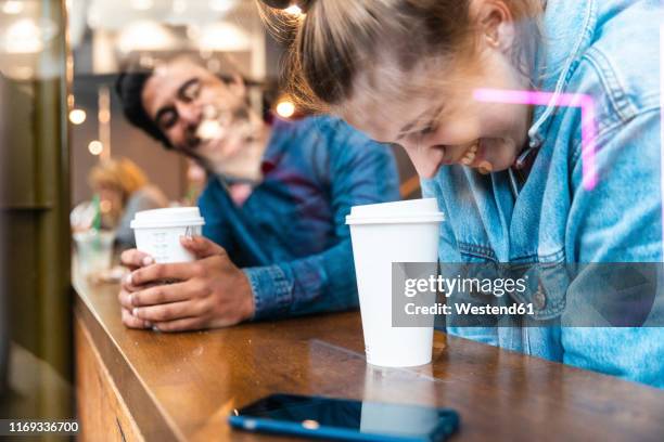 friends having fun together in a coffee shop - coffee meeting with friends foto e immagini stock