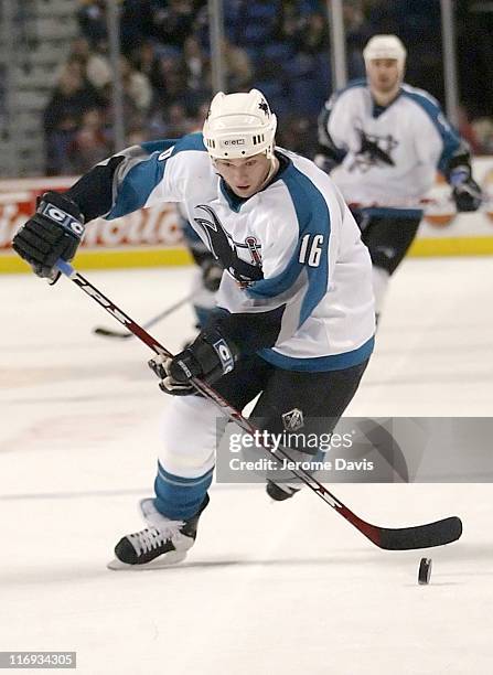 San Jose Sharks' Mark Smith carries the puck up ice versus the Buffalo Sabres at the HSBC Arena in Buffalo, NY, December 02, 2005. San Jose defeated...