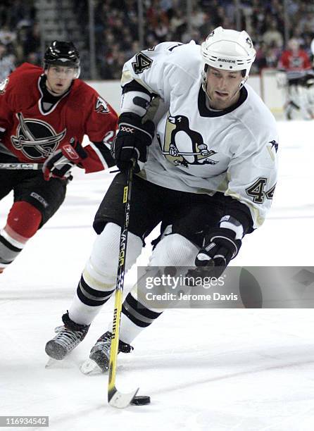 Pittsburgh Penguins' Brooks Orpik carries the puck up ice versus Buffalo Sabres at the HSBC Arena in Buffalo, NY, December 17, 2005. The Sabres...