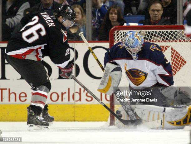 Buffalo Sabres' Thomas Vanek is stopped by Atlanta Thrashers' goalie, Kari Lehtonen during a game at the HSBC Arena in Buffalo, NY, March 1, 2006....