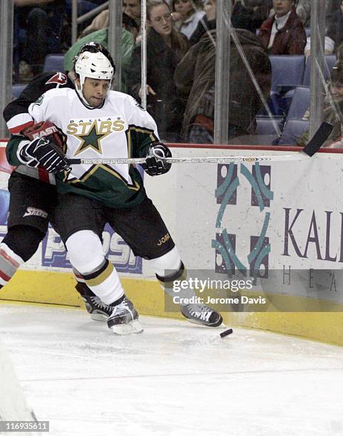 Dallas Stars' Troy Daley plays the puck behind the net during a game versus the Buffalo Sabres at the HSBC Arena in Buffalo, NY, December 14, 2005....