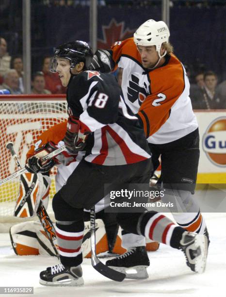 Daniel Briere of the Buffalo Sabres skates away from Derian Hatcher of the Philadelphia Flyers during game 5 of the Eastern Quarter finals at the...