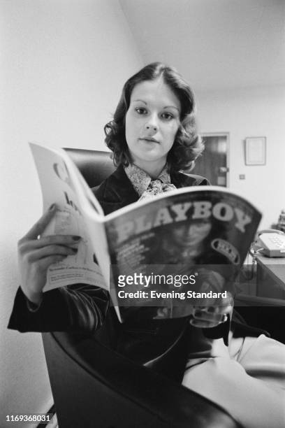American businesswoman and activist Christie Hefner holding a copy of 'Playboy', UK, 2nd December 1976.