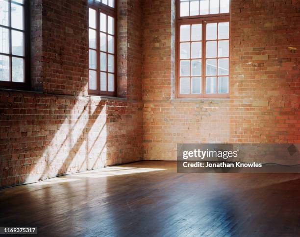 brick room - sparse room stock pictures, royalty-free photos & images