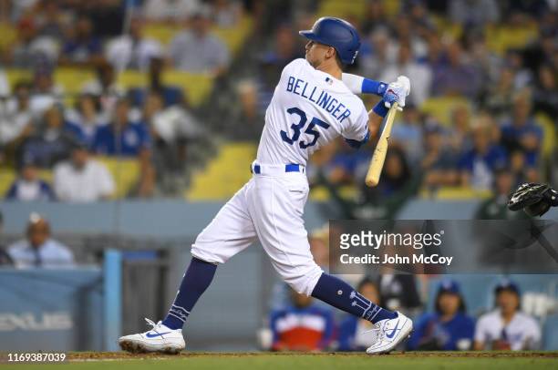 Cody Bellinger of the Los Angeles Dodgers hits a solo home run in the eighth inning against the Tampa Bay Rays at Dodger Stadium on September 18,...