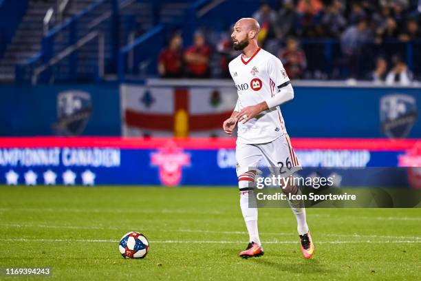 Toronto FC defenceman Laurent Ciman looks for a pass target during the Toronto FC versus the Montreal Impact game on September 18 at Stade Saputo in...