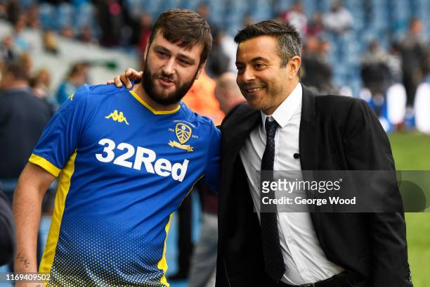 Andrea Radrizzani Chairman of Leeds United poses for a photograph with a Leeds United fan prior to the Sky Bet Championship match between Leeds...