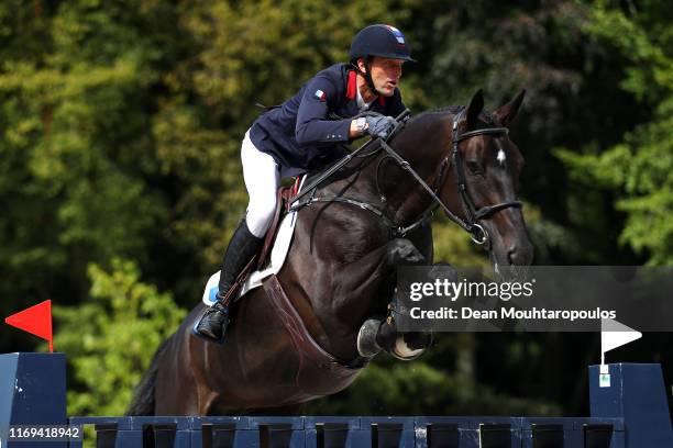 Kevin Staut of France riding Calevo 2 competes during Day 3 of the Longines FEI Jumping European Championship, speed competition against the clock,...