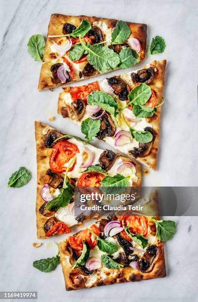 flatbread pizza on white background - flatbread stock pictures, royalty-free photos & images