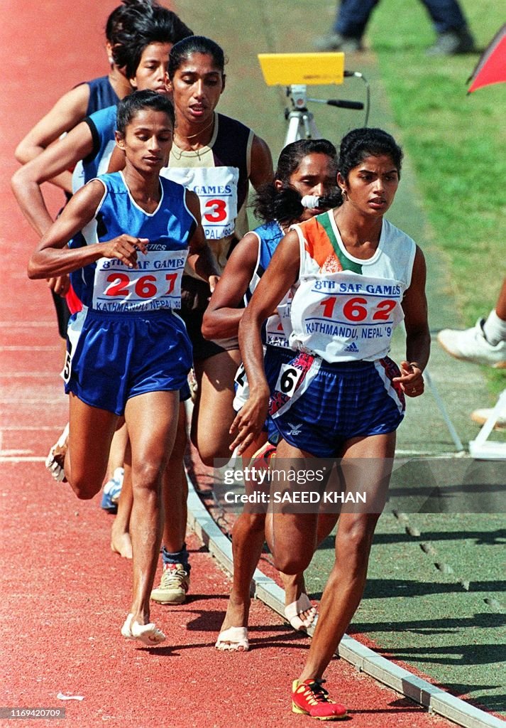 Sunita Rani Indian athlete Sunita Rani leads a women's 5000 meter race on the ...