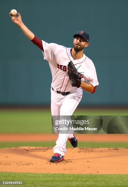 Starting pitches Rick Porcello of the Boston Red Sox throws to a Philadelphia Phillies batter during the first inning at Fenway Park on August 21,...