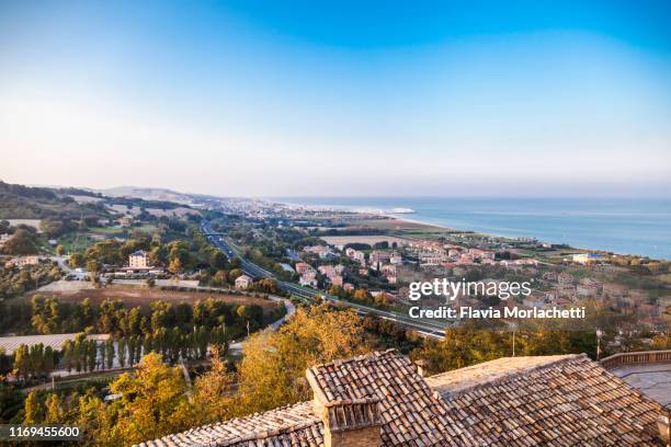 cityscape along adriatic sea, le marche, italy - fermo stock pictures, royalty-free photos & images