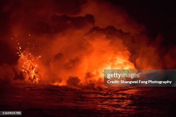 lava splash into the pacific ocean - big island volcano national park stock pictures, royalty-free photos & images