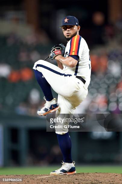 Roberto Osuna of the Houston Astros pitches in the ninth inning against the Baltimore Orioles at Oriole Park at Camden Yards on August 9, 2019 in...