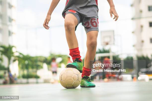 foot on soccer ball for kick off on sport court - off court imagens e fotografias de stock