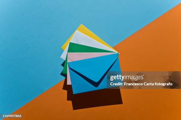colored envelopes - message ストックフォトと画像