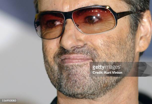 Director George Michael arrives to the press conference for his film "George Michael: A Different Story"