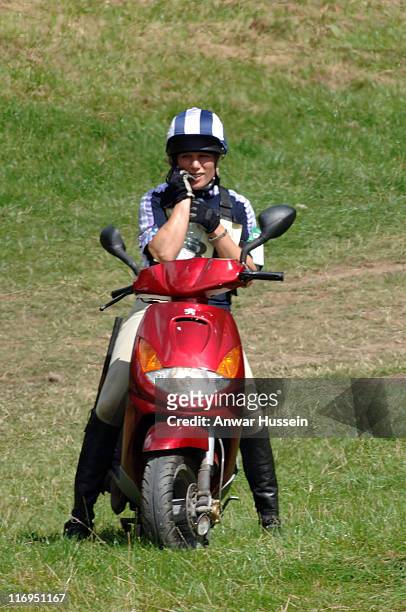 Zara Phillips, daughter of Princess Anne, rides a scooter on the third day of the Gatcombe Park Festival of British Eventing at Gatcombe Park, on...