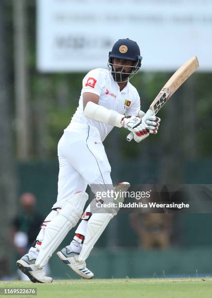 Lahiru Thirimanne of Sri Lanka hits out during day one of the Second Test match between Sri Lanka and New Zealand at P Sara Oval Stadium on August...