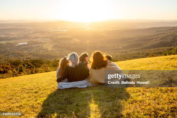 spending time with family on a cool winters afternoon. - australian family time stockfoto's en -beelden