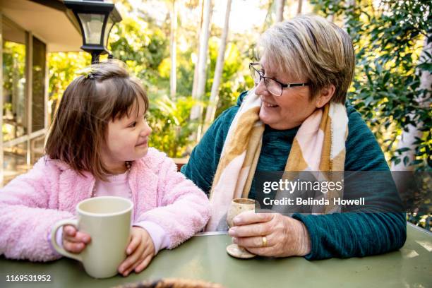 spending time with family on a cool winters afternoon. - australian family time stockfoto's en -beelden