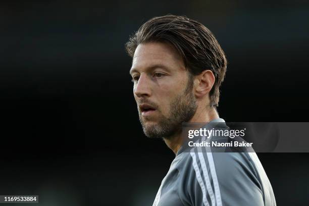 Harry Arter of Fulham looks on during the warm up ahead of the Sky Bet Championship match between Fulham and Leeds United at Craven Cottage on August...