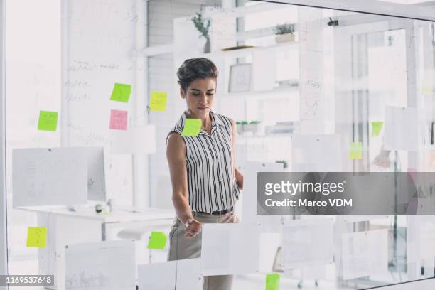 formulating her winning plan - transparent wipe board stock pictures, royalty-free photos & images