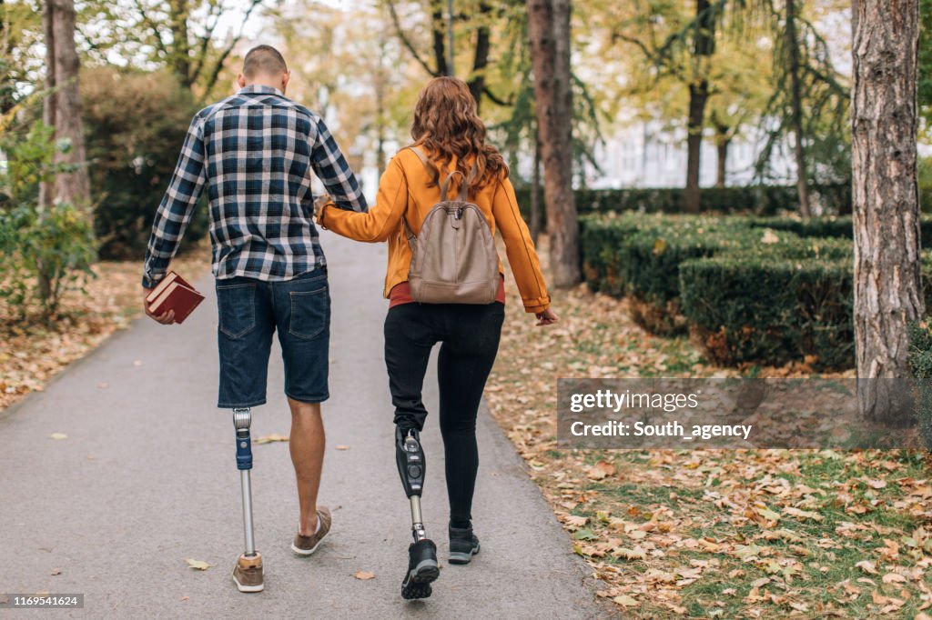 Couple walking in park