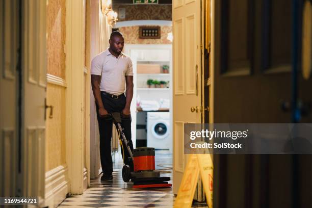 cleaning the corridors - hotel cleaner stock pictures, royalty-free photos & images