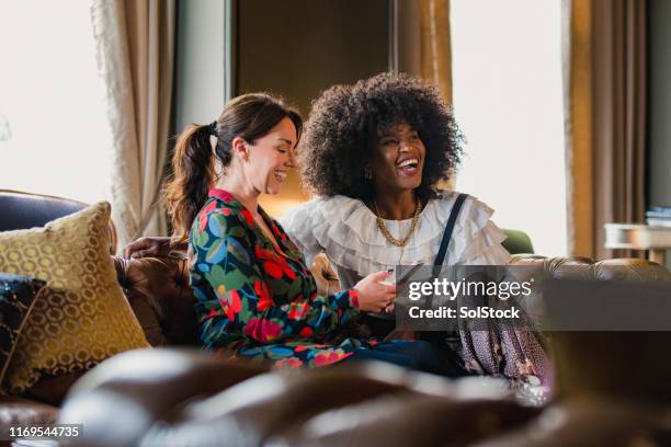 love and laughter - couch close up stock pictures, royalty-free photos & images