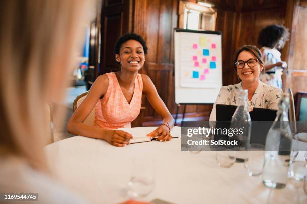brainstorming at the conference table - topics stock pictures, royalty-free photos & images