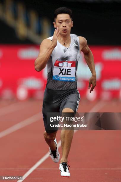 Zhenye Xie of China competes in the Men's 100m Round 1 Heat 2 race during the Muller Birmingham Grand Prix & IAAF Diamond League event at Alexander...