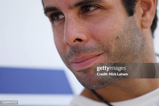 Vitor Meira of Brazil, driver of the ABC Supply Co A.J. Foyt Racing Dallara Honda sits in pitlane during practice for the IRL IndyCar Series...