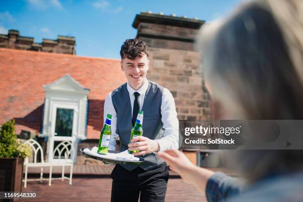 delivery of drinks - hotel occupation stock pictures, royalty-free photos & images