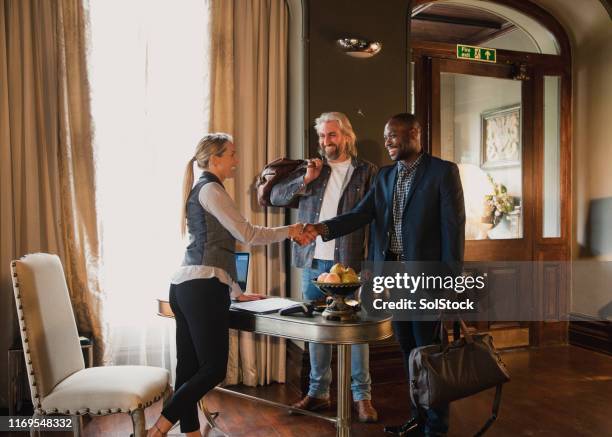 greeting the guests - hotel guest stock pictures, royalty-free photos & images